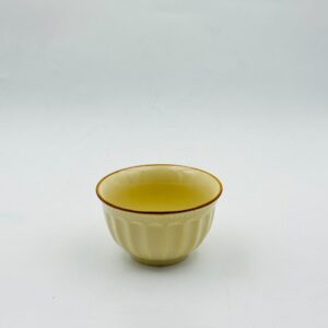 Yellow Ceramic Serving Bowl with Brown Rim
